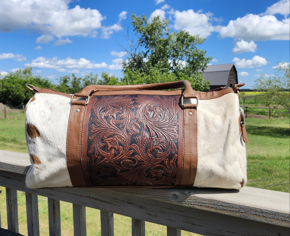 Cowhide With Tooled Leather Center Duffle Bag